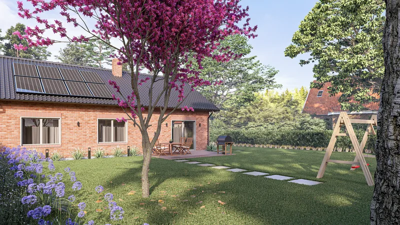 Garten mit Terrasse und blühendem Baum